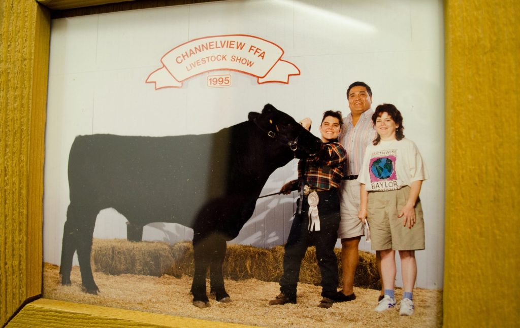 Youth exhibitor with a steer at the Channelview FFA Livestock Show, 1995
