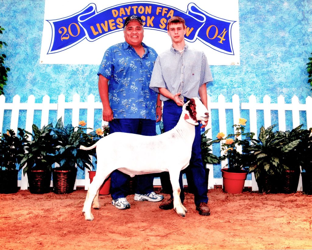 Youth exhibitor with a goat at the Dayton FFA Livestock Show, 2004