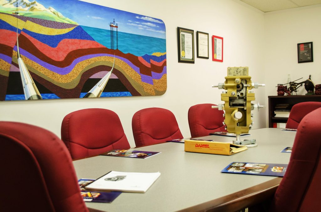 FAB Industries conference room with a cutaway orifice fitting