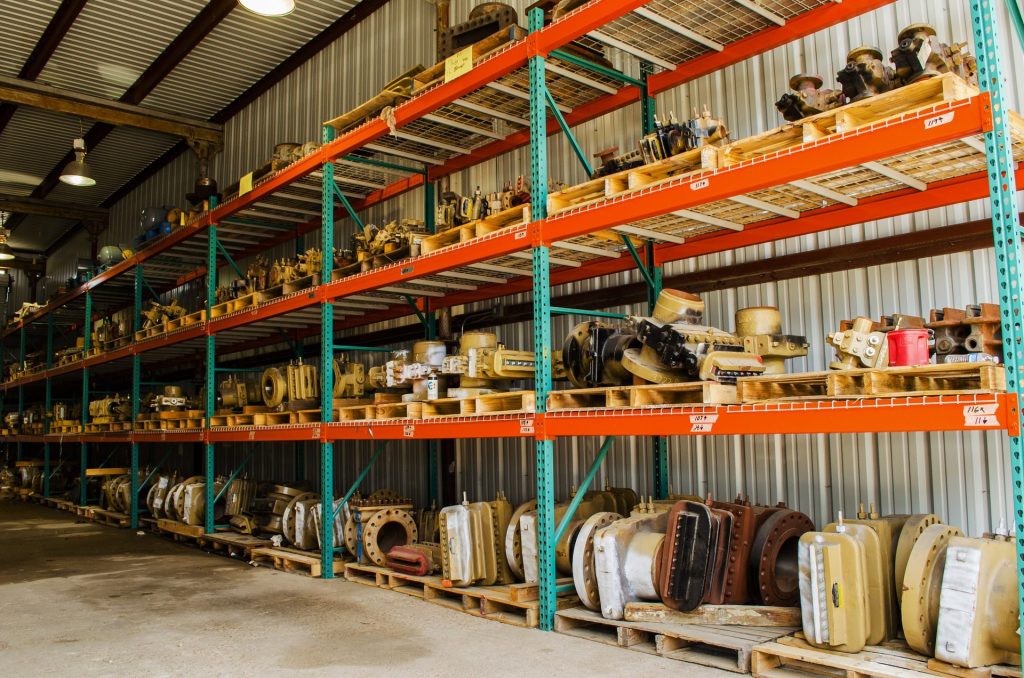 Pallet racks of orifice fitting inventory at FAB Industries