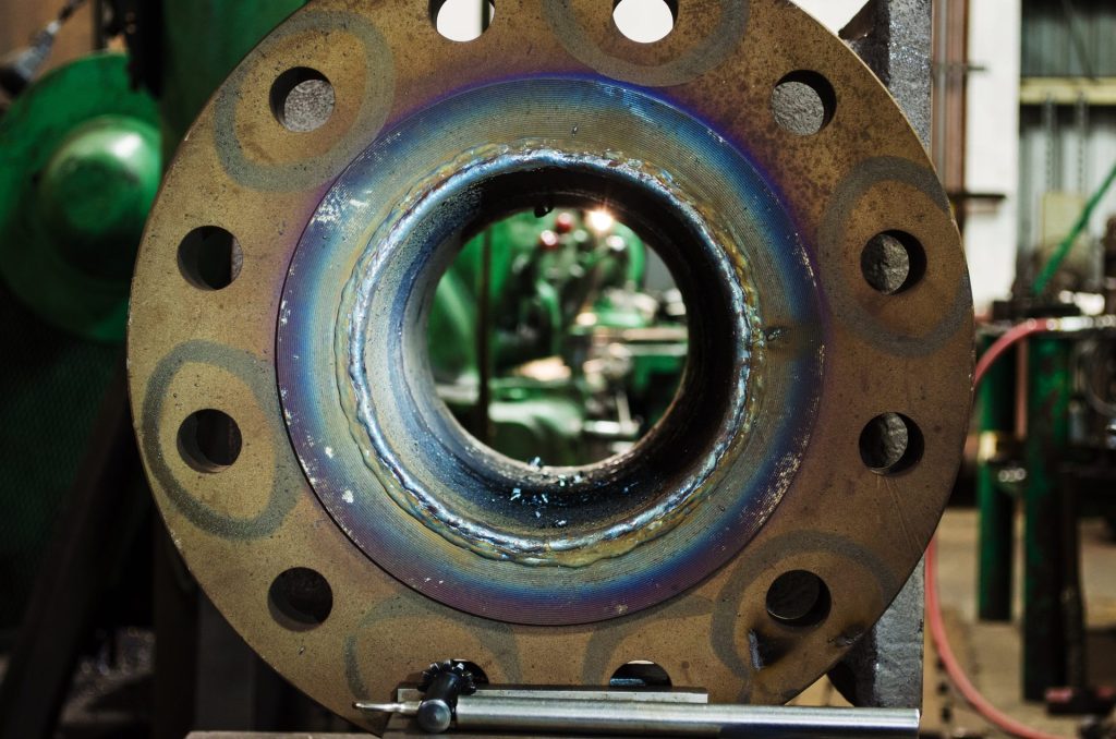 Flange with weld overlay before machining